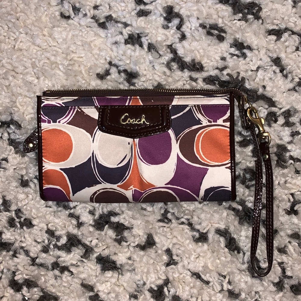 Coach Wristlet Orange, Purple, Blue, Brown, Cream.